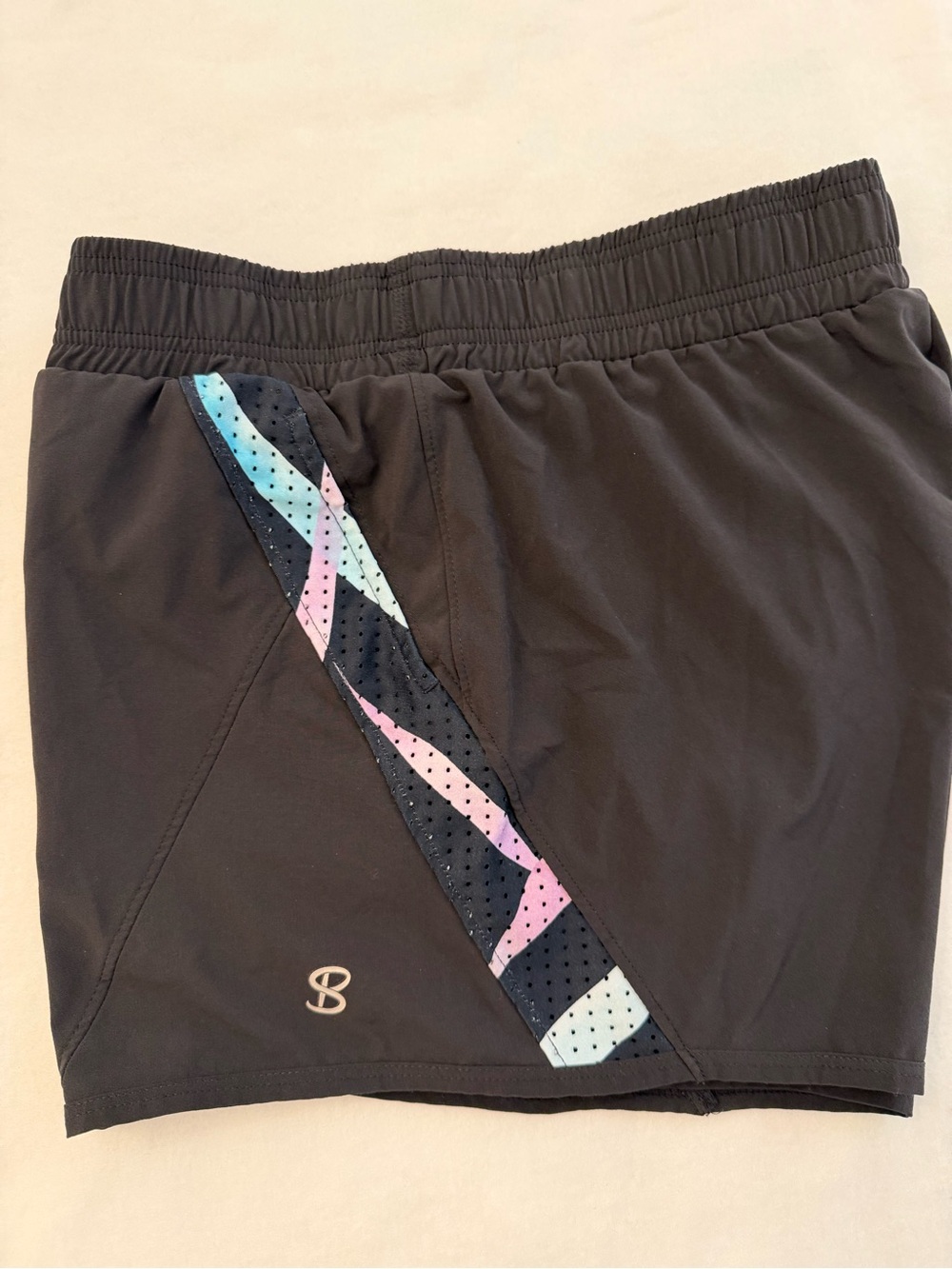 Sofibella Black Women's Active Tennis Shorts side Panel accents in Pastel color - Picture 2 of 7